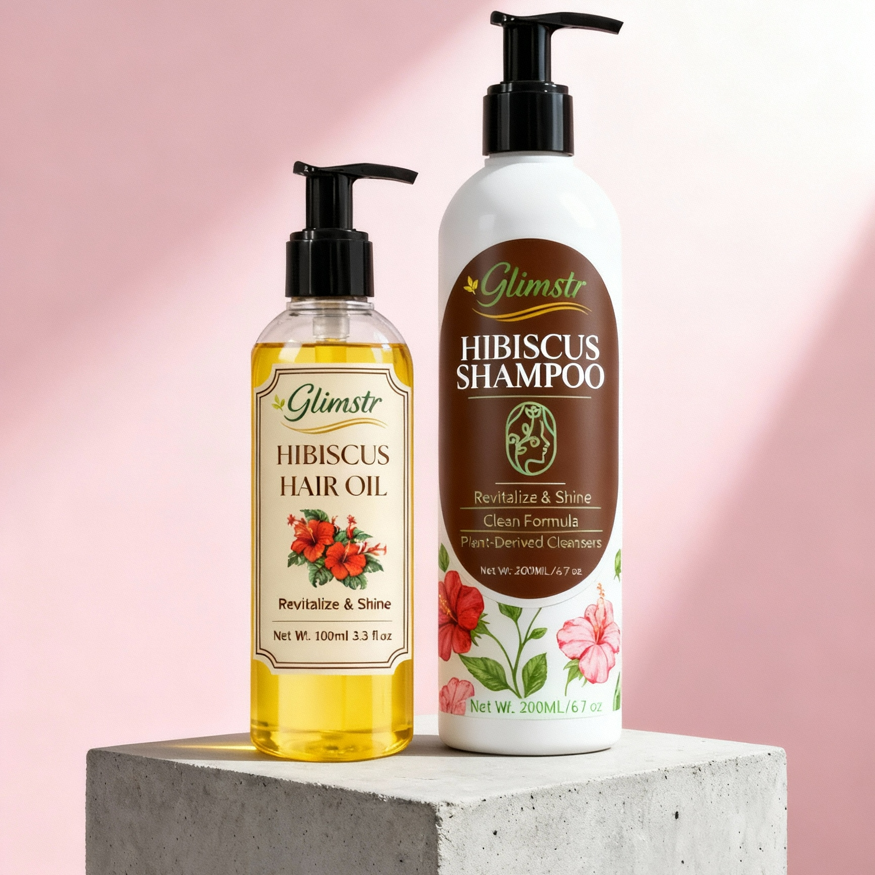 Glimstr hibiscus hair oil and shampoo on a concrete block with a pink background